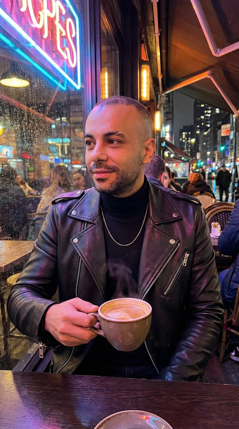 Create a dramatic, neon-lit café scene featuring a man (use…